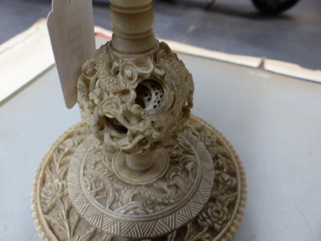 A CHINESE IVORY PUZZLE BALL CARVING WITH STAND HAVING A ROTATING RETICULATED KNOP AND A FURTHER - Image 13 of 20