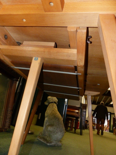 AN ERCOL PALE ELM EXTENDING DINING TABLE WITH TWO LEAVES TOGETHER WITH A SET OF EIGHT ERCOL STICK - Image 4 of 5