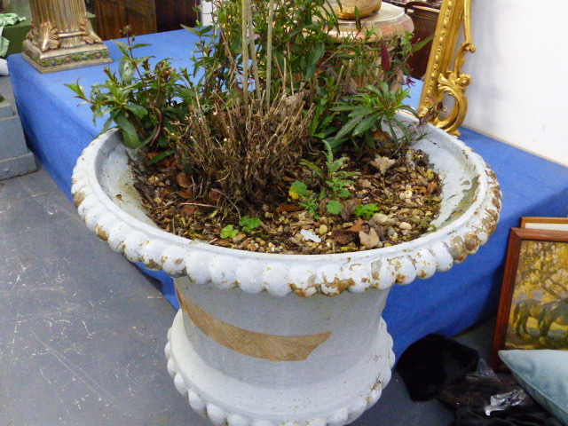 A PAIR OF ANTIQUE CAST IRON CAMPAGNA GARDEN URNS OF RIBBED FORM AND PLINTH BASES. OVERALL H.105cms. - Image 6 of 10