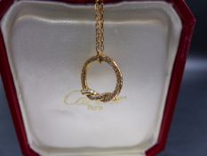 AN 18ct DIAMOND SET CARTIER PENDANT COMPLETE WITH CERTIFICATE AND BOX, SERIAL NUMBER VM7406. TOTAL