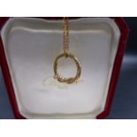 AN 18ct DIAMOND SET CARTIER PENDANT COMPLETE WITH CERTIFICATE AND BOX, SERIAL NUMBER VM7406. TOTAL