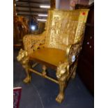 A PAIR OF EGYPTIAN REVIVAL CARVED GILT WOOD ARMCHAIRS, THE LIONESS HEADED FRONT LEGS WITH PAW FEET.