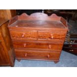 A VICTORIAN PINE GALLERY TOP CHEST OF TWO SHORT AND TWO LONG DRAWERS WITH ORIGINAL PAINT DECORATION.