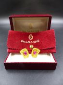 ILIAS LALAOUNIS, A PAIR OF 18ct YELLOW GOLD CABOCHON RUBY CLIP ON EARRINGS.