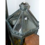 A PATINATED BRASS GLAZED HALL LANTERN. H.81cms.