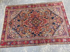 A PERSIAN HAMADAN RUG. 200 x 142cms.