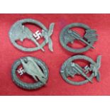 TWO LUFTWAFFE FLAK BADGES, ONE FURTHER AND A PARACHUTIST'S BADGE. (4)