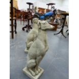 A PAIR OF COMPOSITE STONE FIGURES OF SEATED GREYHOUNDS. H.54cms.