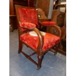 A RED VELVET UPHOLSTERED OAK GOTHIC REVIVAL SHOW FRAME ARMCHAIR, THE TAPERING FRONT LEGS FLUTED