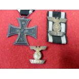 1939 BAR TO THE 1914 CROSS, MOUNTED ON RIBBON, A 1914 2ND CLASS IRON CROSS AND A 1939 SECOND CLASS