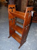 AN ARTS AND CRAFTS OAK OPEN BOOKCASE WITH TROUGH TOP OVER TWO SHELVES. 44.5 x 20 x H.85.5cms.