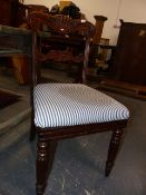 A SET OF FOUR Wm.IV. CARVED ROSEWOOD DINING CHAIRS ON TURNED AND REEDED LEGS. (4)