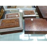 FOUR INDIAN INLAID BOXES, TWO WITH THE TAJ MAHAL CARVED IN RELIEF ON THE LIDS, THE LARGER, 23 x