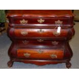 A DUTCH MAHOGANY BOMBE CHEST OF FOUR LONG DRAWERS ABOVE A SHAPED APRON, PAW FEET