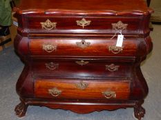 A DUTCH MAHOGANY BOMBE CHEST OF FOUR LONG DRAWERS ABOVE A SHAPED APRON, PAW FEET