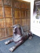 A PAIR OF IMPRESSIVE LARGE BRONZE FIGURES OF RECUMBENT SPHINX. L.190 x H.92cms.