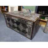 AN ANTIQUE INDO PERSIAN MOTHER OF PEARL INLAID AND CARVED HARDWOOD COFFER WITH CARRYING HANDLES. W.