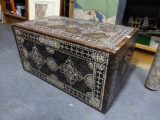 AN ANTIQUE INDO PERSIAN MOTHER OF PEARL INLAID AND CARVED HARDWOOD COFFER WITH CARRYING HANDLES. W.