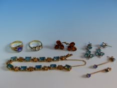 AN 18ct TRIPLE MOONSTONE RING, A PAIR OF 9ct GOLD CITRINE EARRINGS, A GOLD AND GEMSET BRACELET, A