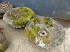 A GROUP OF COMPOSITE STONE GARDEN URNS.