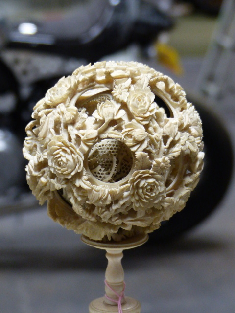 A CHINESE IVORY PUZZLE BALL CARVING WITH STAND HAVING A ROTATING RETICULATED KNOP AND A FURTHER - Image 2 of 20