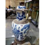 A CHINESE CRACKLEWARE BLUE AND WHITE BALUSTER VASE AND COVER PAINTED WITH PHOENIXES AND FLOWERS