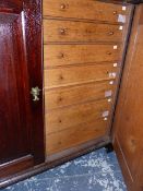 A GEORGIAN AND LATER OAK COLLECTOR'S CABINET, THE BASE FITTED WITH SHALLOW SPECIMEN DRAWERS ENCLOSED