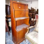 A 19th.C.AND LATER SATINWOOD SMALL WATERFALL BOOKCASE WITH CUPBOARDS BELOW. 63 x 31 x H.137cms.