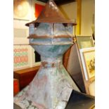 A SHEET PARTIALLY TINNED IRON CHIMNEY COWL, THE HAT SHAPED TOP WITH GILT SPIRE FINIAL AND RAISED