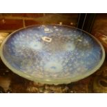 A PIERRE D'AVESN IRRIDESCENT GLASS DISH REVERSE MOULDED WITH THREE DAISY HEADS, SIGNED WITHIN THE