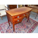 AN ANTIQUE GEO.III. STYLE MAHOGANY AND INLAID BOW FRONT SIDEBOARD FITTED WITH FIVE DRAWERS ON SHAPED