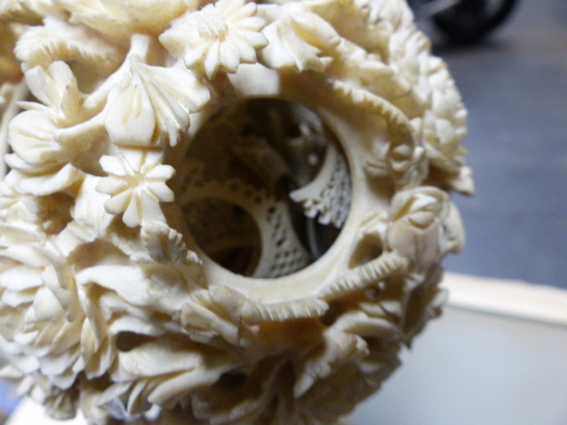 A CHINESE IVORY PUZZLE BALL CARVING WITH STAND HAVING A ROTATING RETICULATED KNOP AND A FURTHER - Image 16 of 20