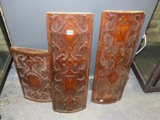 THREE OAK PANELS, THE SHALLOW BOW FRONTS RELIEF CARVED WITH RENAISSANCE STYLE GEOMETRIC DESIGNS.