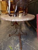 A FRENCH MOTTLED LIVER RED MARBLE CIRCULAR TABLE TOPPED WROUGHT IRON TRIPOD TABLE Dia.77 x H.73cms