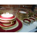 AN AYNSLEY PART DINNER SERVICE, EACH PIECE WITH GILT BEADING ENCLOSING CLARET AND CREAM BANDS. 55