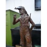 A BRONZE FIGURE OF AN EARLY 19th.C.DANDY RAISING HIS RIGHT HAND TO HIS BICORNE HAT. H.75cms.