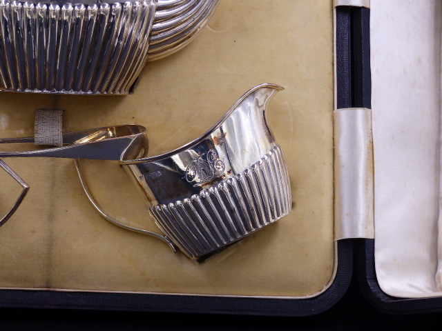 A CAMPBELL & LUMBY CASED SILVER THREE PIECE TEASET, THE HALF GADROONED TEA POT AND CREAM JUG, - Image 4 of 12