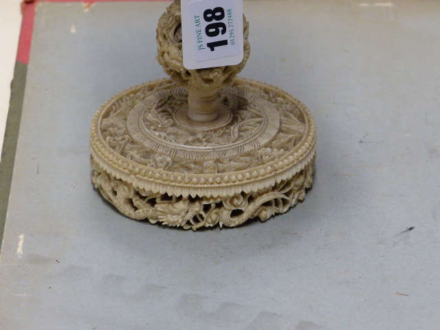 A CHINESE IVORY PUZZLE BALL CARVING WITH STAND HAVING A ROTATING RETICULATED KNOP AND A FURTHER - Image 4 of 20