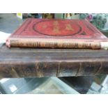 TWO WORLD ATLASES, THE LEATHER BOUND FOLIO EDITION BY G.W.BACON, 1893 AND THE RED CLOTH BOUND 2nd.