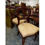 A SET OF SIX VICTORIAN MAHOGANY BALLOON BACK DINING CHAIRS TOGETHER WITH A SIMILAR PAIR OF