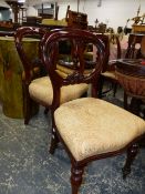 A SET OF SIX VICTORIAN MAHOGANY BALLOON BACK DINING CHAIRS TOGETHER WITH A SIMILAR PAIR OF