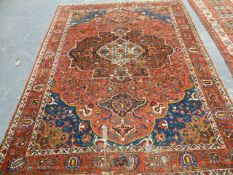 AN ANTIQUE PERSIAN BAKTIARI RUG. 288 x 219cms.