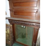 A LARGE 19th.C.OAK OVERMANTLE MIRROR WITH CARVED FRAME DECORATION. 107 x 168cms.