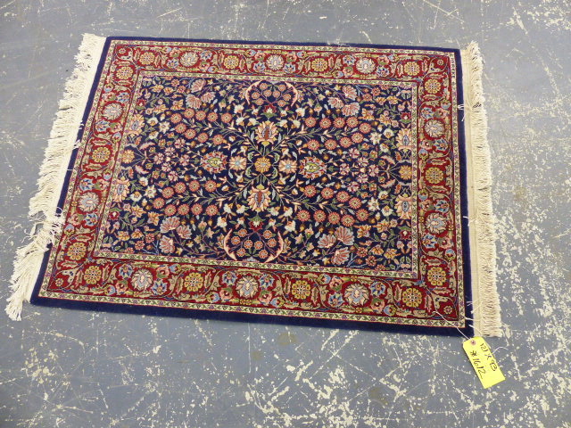 A TURKISH HEREKE RUG. 121 x 93cms.