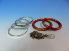 TWO APPLE CORAL VINTAGE BANGLES TOGETHER WITH FOUR SILVER BANGLES, TWO WITH SPECIMEN HALLMARKS AND