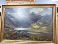 19th.C.ENGLISH SCHOOL. A HIGHLAND LOCH, SIGNED INDISTINCTLY, OIL ON CANVAS. 62 x 92cms.