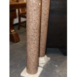 A PAIR OF WHITE MARBLE SQUARE TOPPED CYLINDRICAL GRANITE COLUMNS. 23 x 23 x H.105.5cms.