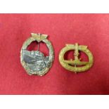 A THIRD REICH SUBMARINE WAR BADGE IN GILT TOGETHER WITH A DAMAGED 1ST PATTERN TORPEDO BOAT BADGE. (