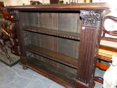 A VICTORIAN OAK OPEN FRONT SMALL BOOKCASE WITH CARVED PANEL SIDES. 121 x 31 x 98cms.