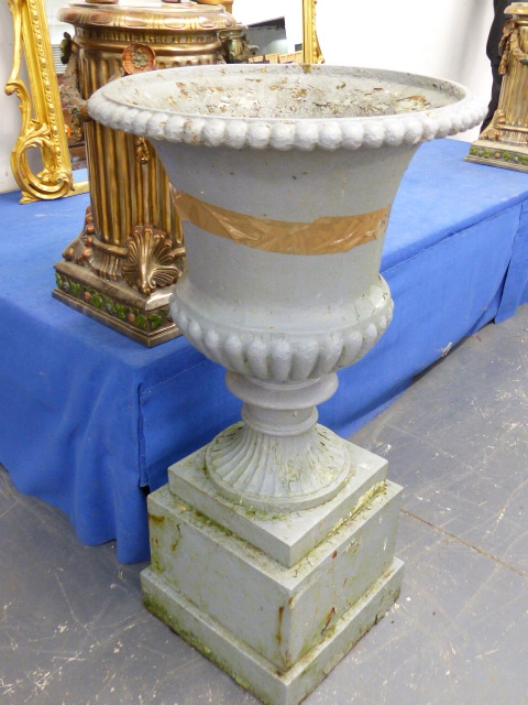 A PAIR OF ANTIQUE CAST IRON CAMPAGNA GARDEN URNS OF RIBBED FORM AND PLINTH BASES. OVERALL H.105cms. - Image 2 of 10